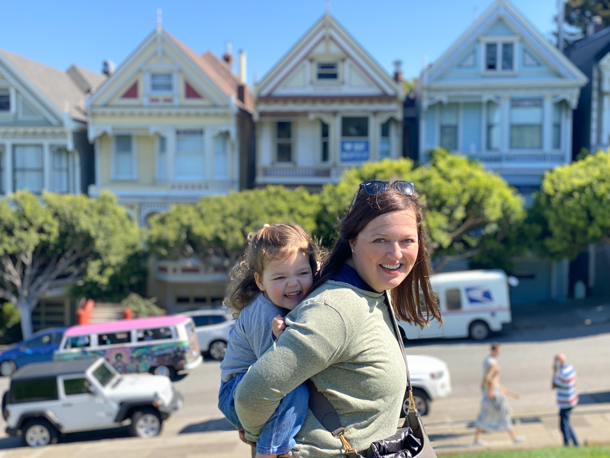 Family posing in front of the Golden Gate Bridge on a San Francisco area private tour with Spark Experiences